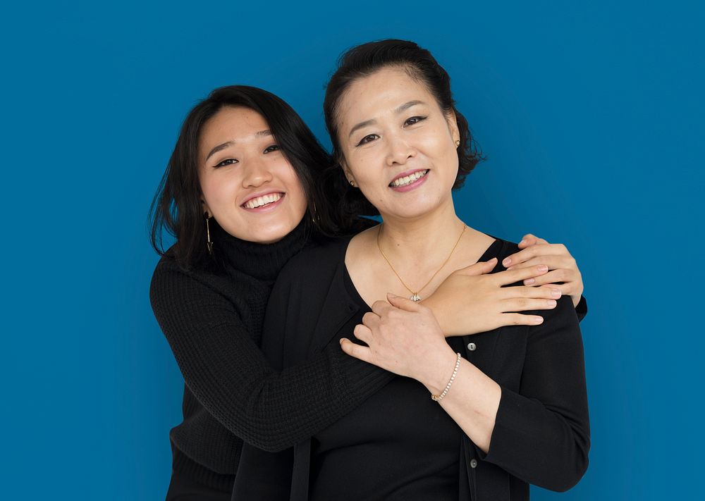 Asian Family Hug Smiling