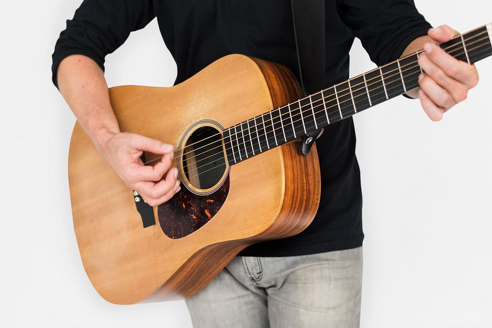 Caucasian Man Playing Guitar Closeup