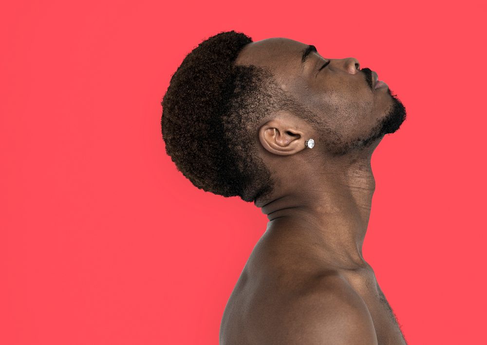 African Man Bare Chest Chin Up Side View Portrait