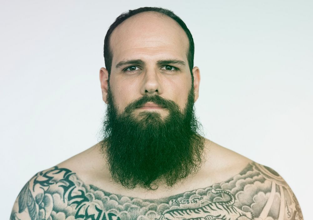 Tattoo Shirtless Man Serious Look Expression Studio Portrait