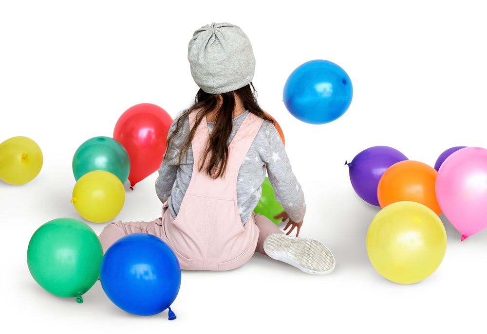 Little Girl Sitting Playing Balloon Portrait