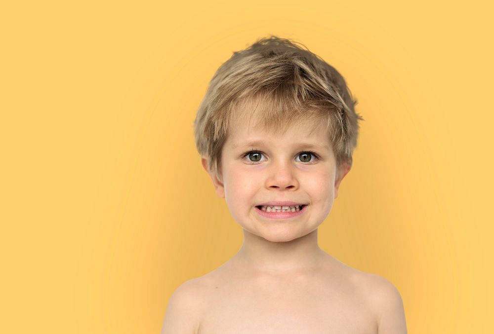 Little Boy Bare Chest Smiling Happiness Studio Portrait