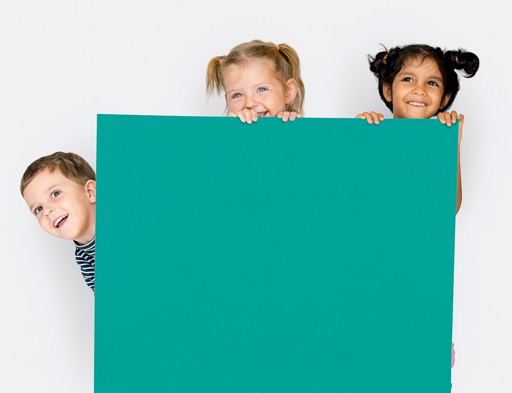 Little Children Holding Empty Paper Smiling