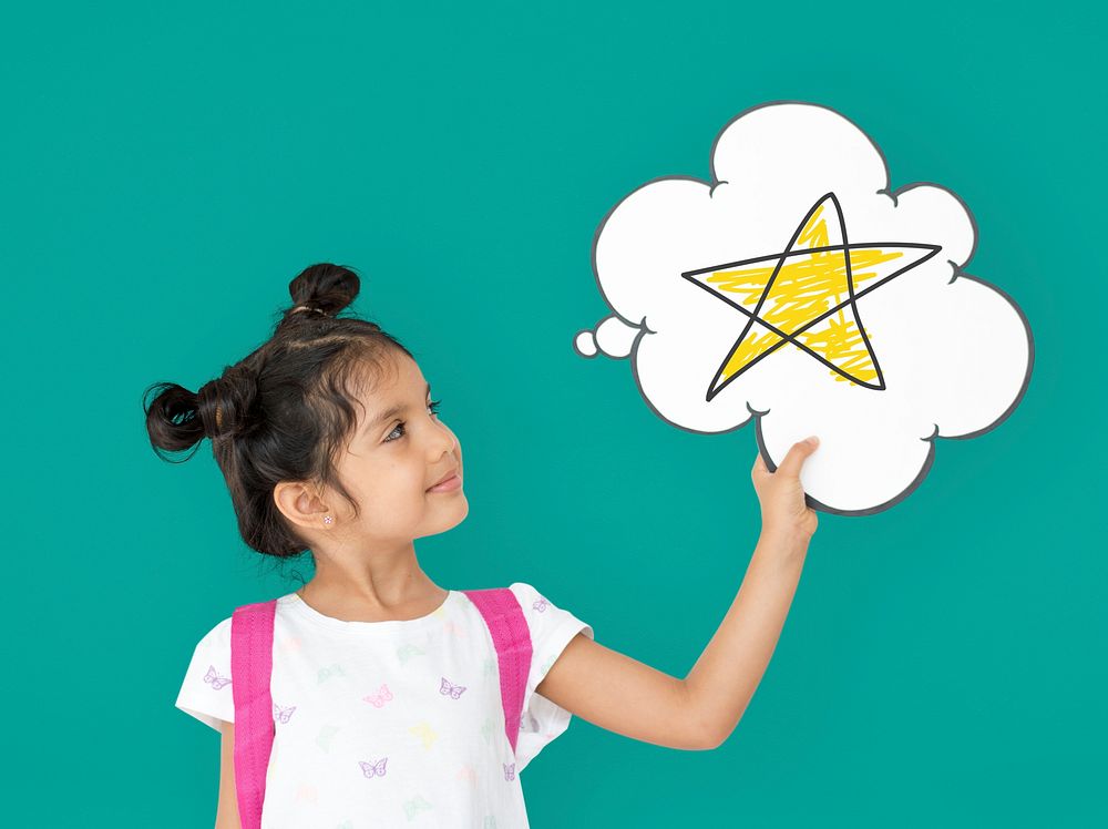 Little girl holding papercraft cloud with star