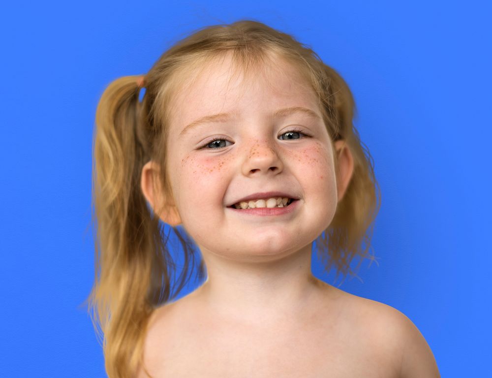 Caucasian Little Girl Bare Chested Smiling