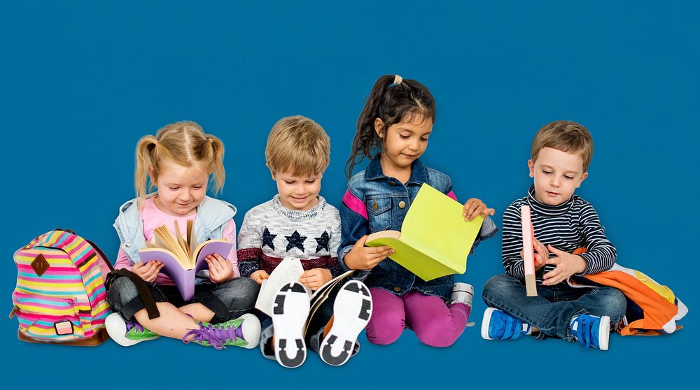 Little Children Reading Books Smiling