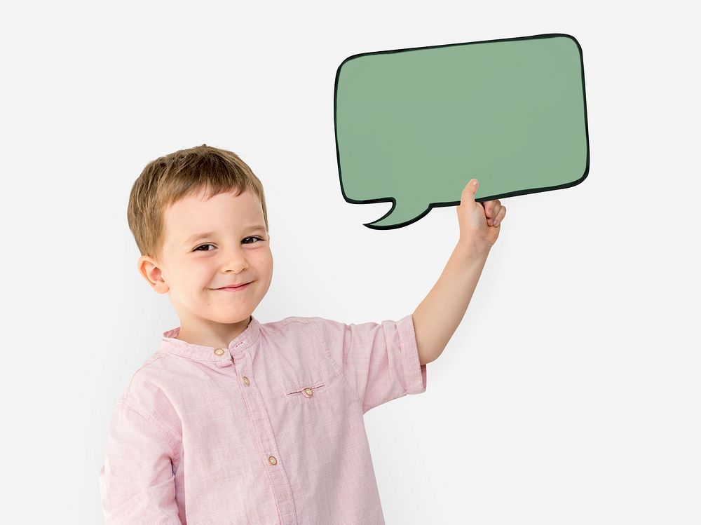 Cute boy holding a speech bubble paper cutout