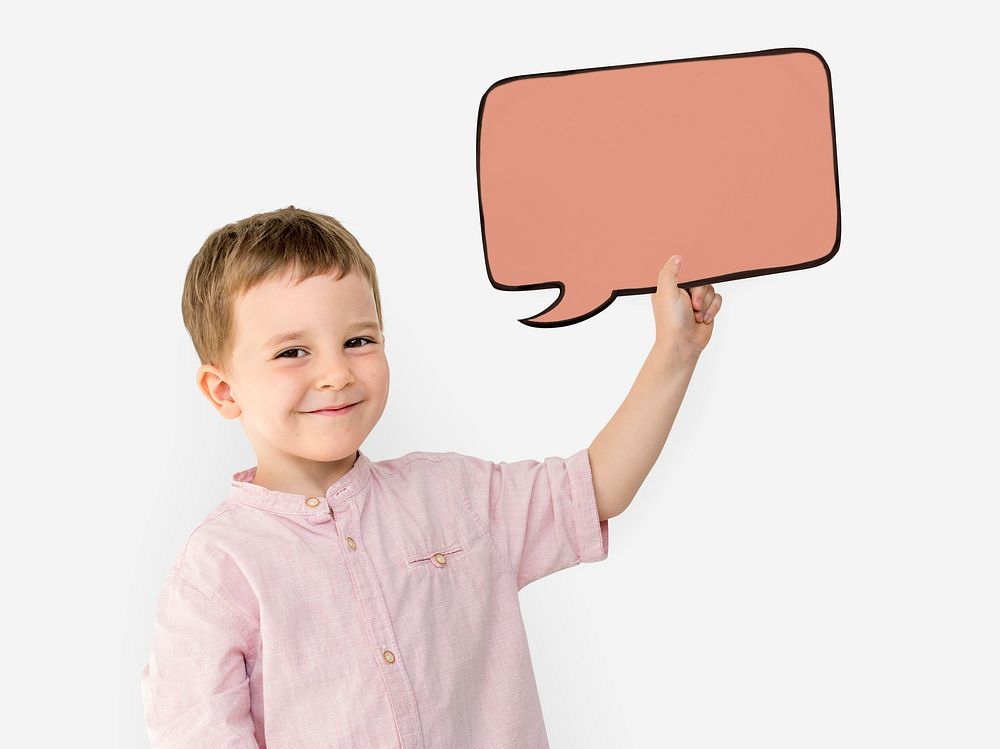 Cute boy holding a speech bubble paper cutout