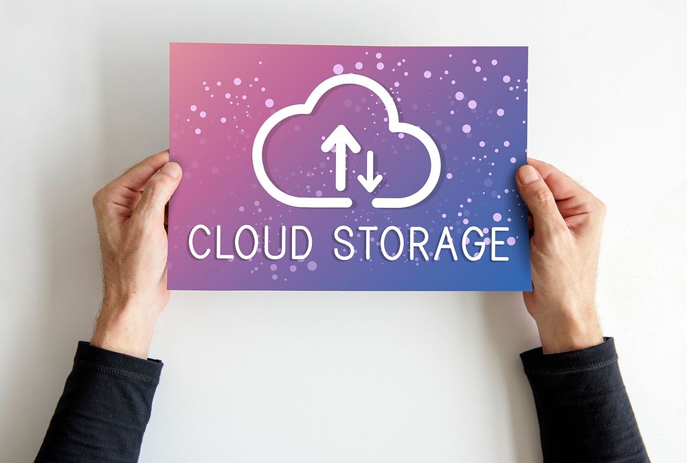 Hands holding a cloud storage sign