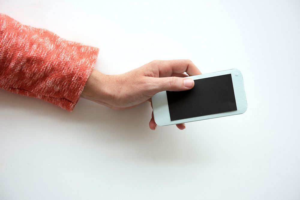 Hand Holding Smartphone White Background