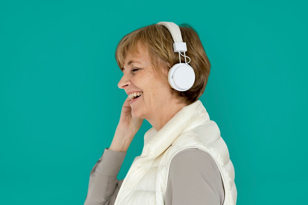 Senior Adult Woman Smiling Happiness Headphones Music Entertainment Studio Portrait