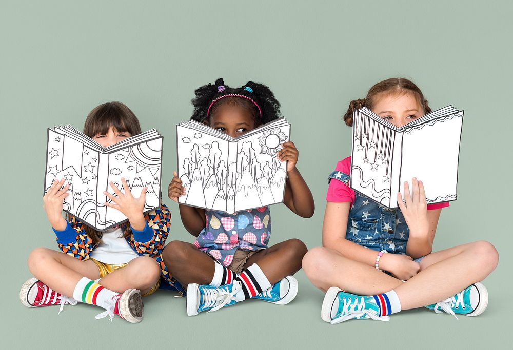 Little Children Reading Sitting Down