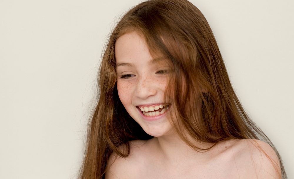 Caucasian Young Girl Bare Chested Smiling