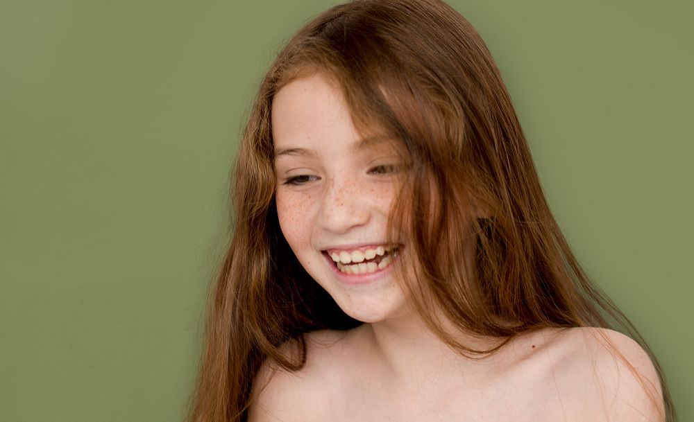 Caucasian Young Girl Bare Chested Smiling