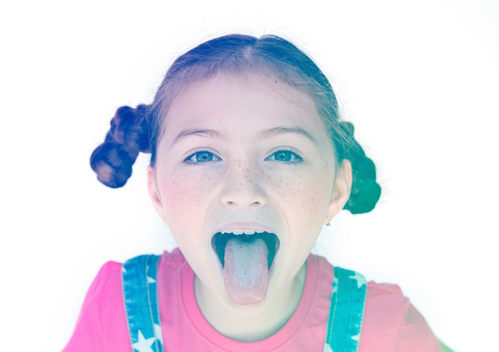 Little Girl Smiling and Sticking Out Tongue