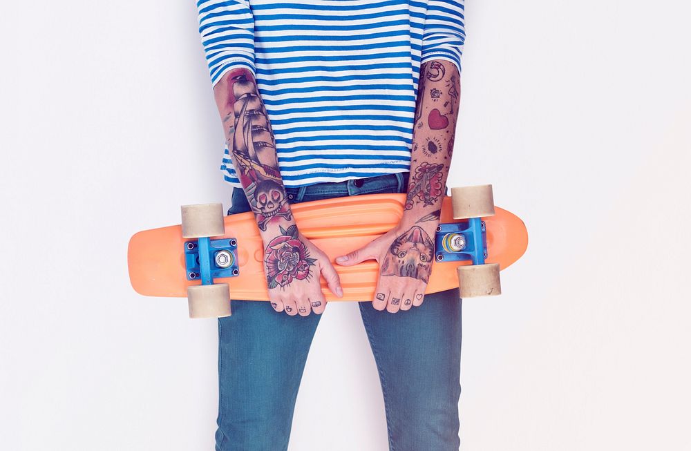 Woman Tattoo Arms Holding Skateboard Studio