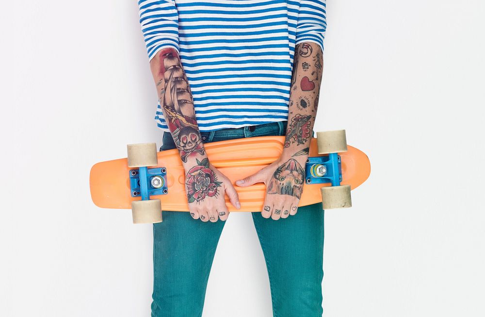 Woman Tattoo Arms Holding Skateboard Studio
