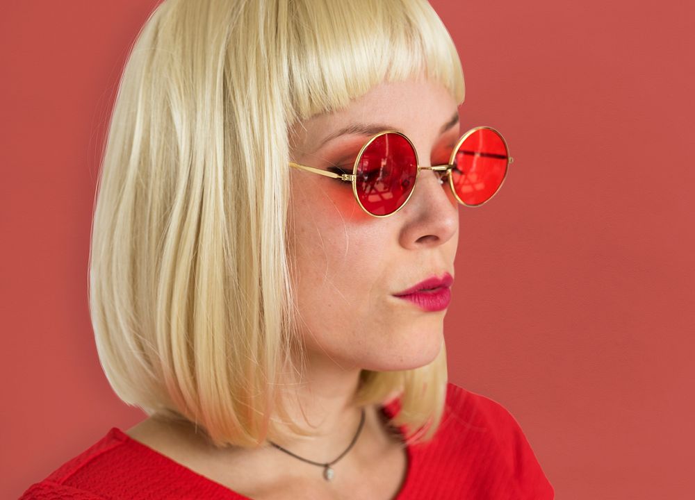 A Short Blonde Hair Woman with Sunglasses