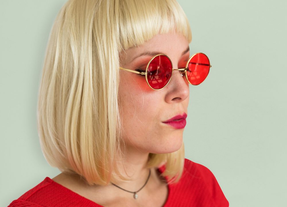 A Short Blonde Hair Woman with Sunglasses