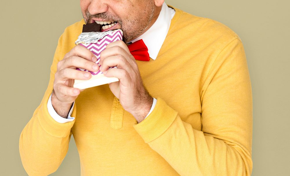 A Man Eatting Chocolate Like Really Hungry