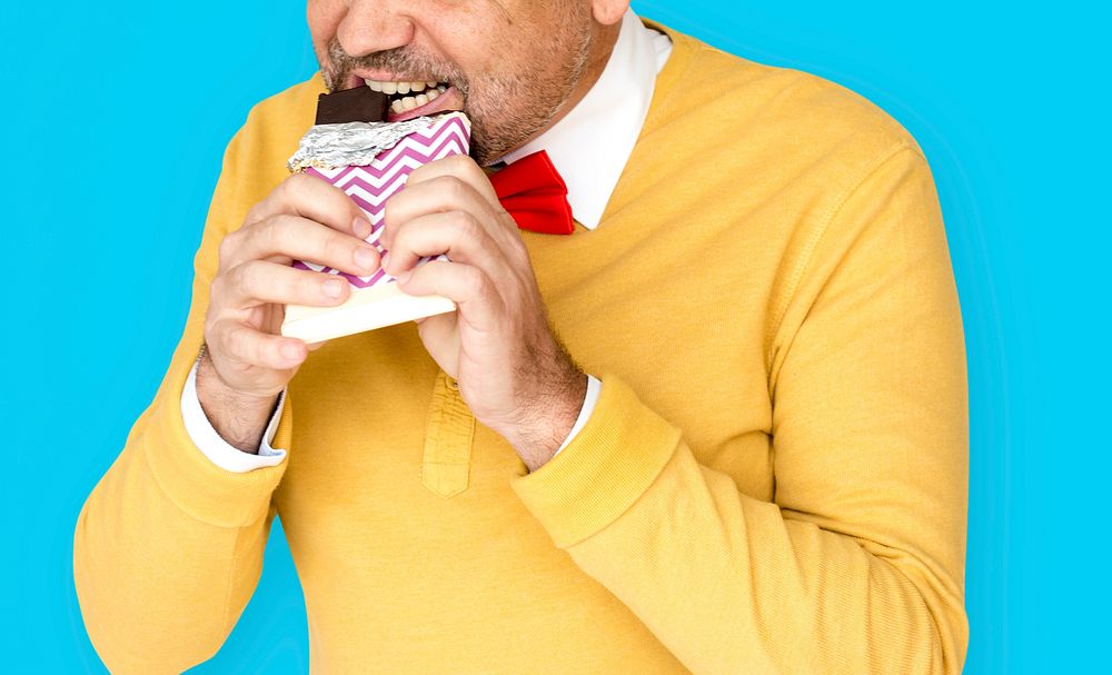 A Man Eatting Chocolate Like Really Hungry