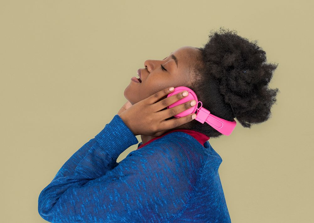 African Descent Female holding headphone