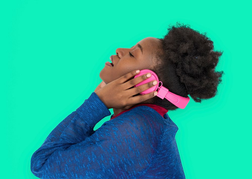 African Descent Female holding headphone