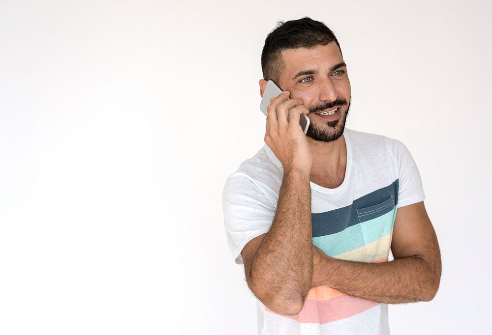 Middle Eastern Man Smiling Happiness Mobile Phone Studio Portrait