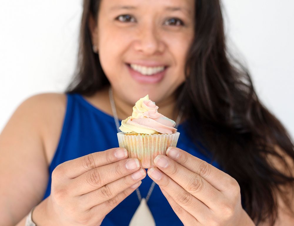 Woman Smiling Happiness Cupcake Studio Portrait