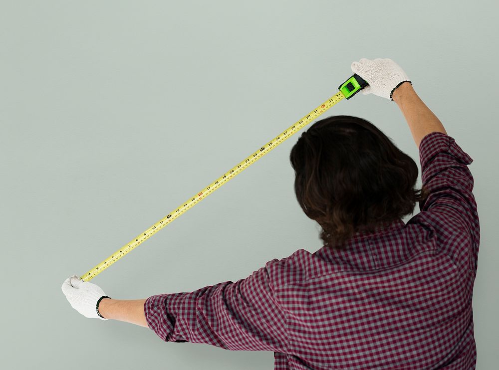 Man Using Tape Rule Measure Studio