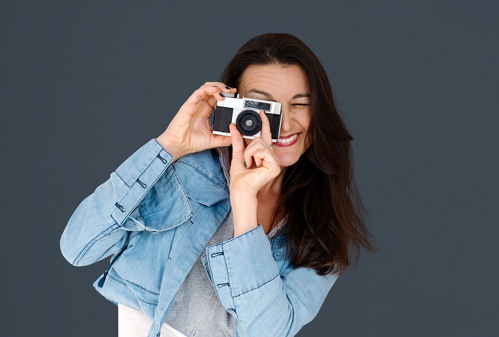 A woman using camera to capture