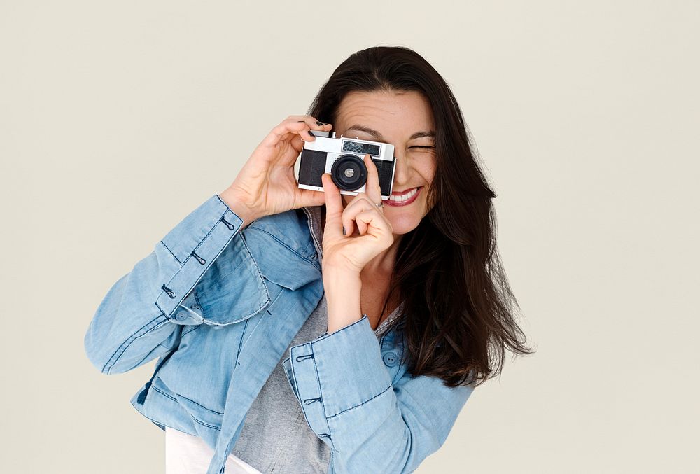 A woman using camera to capture