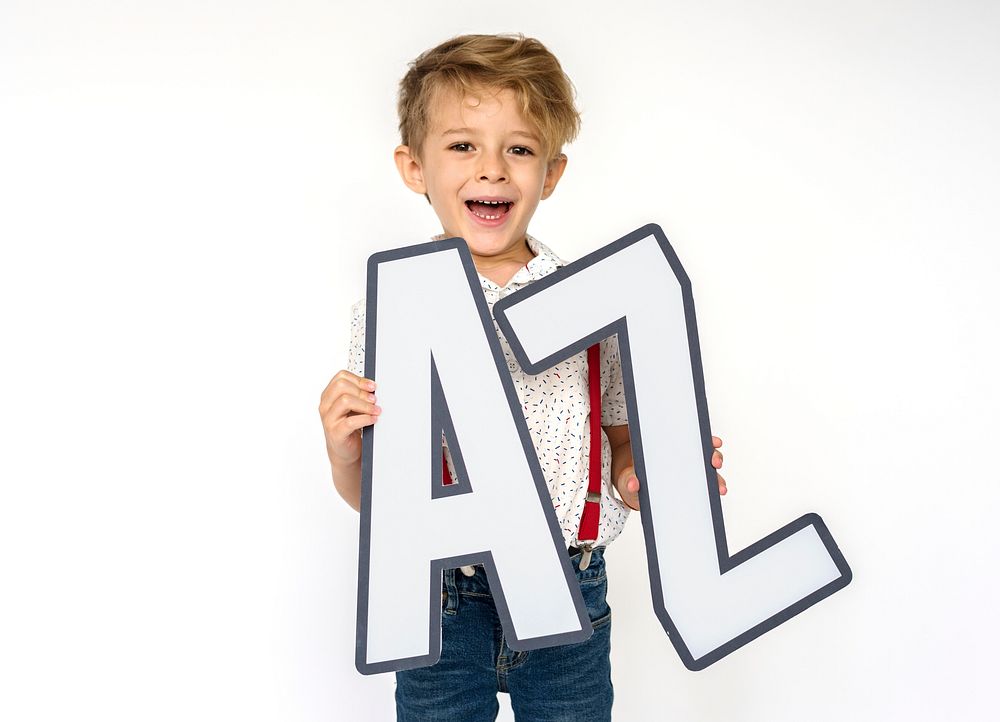 Little boy holding A-Z