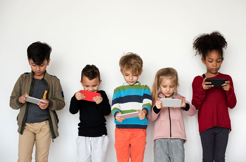 Little kids using smartphones