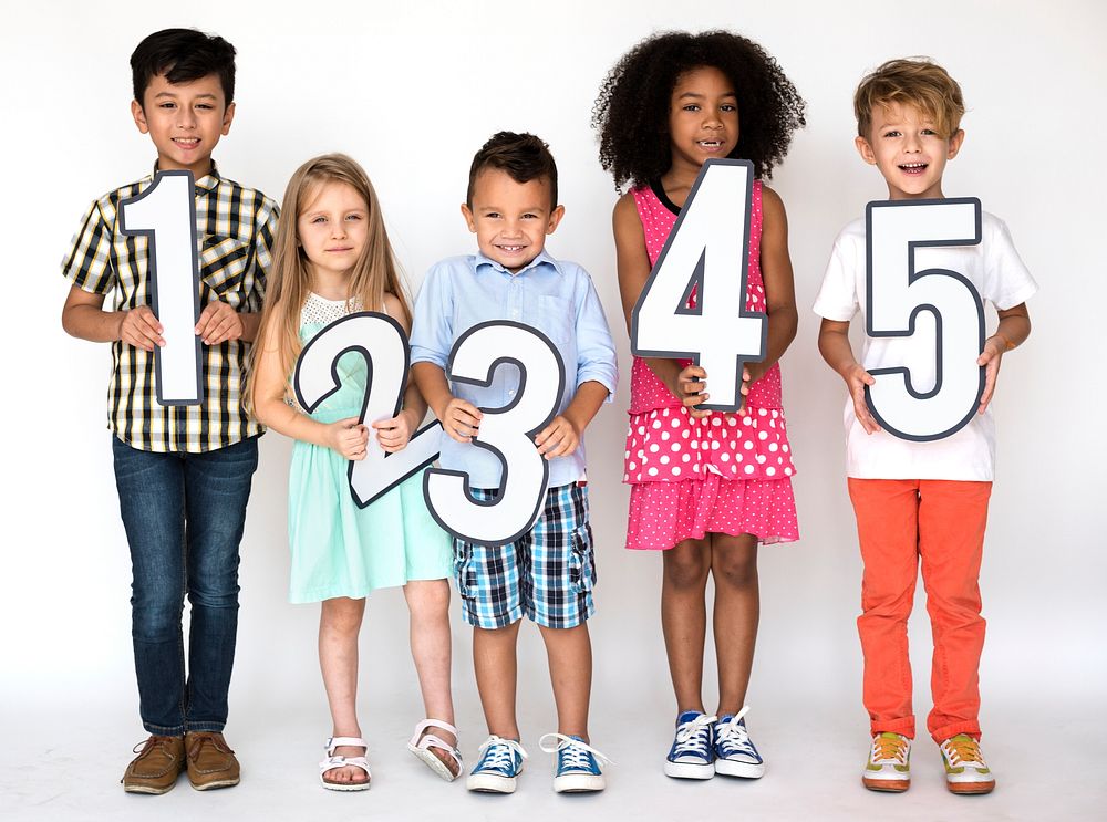 Diverse kids holding numbers