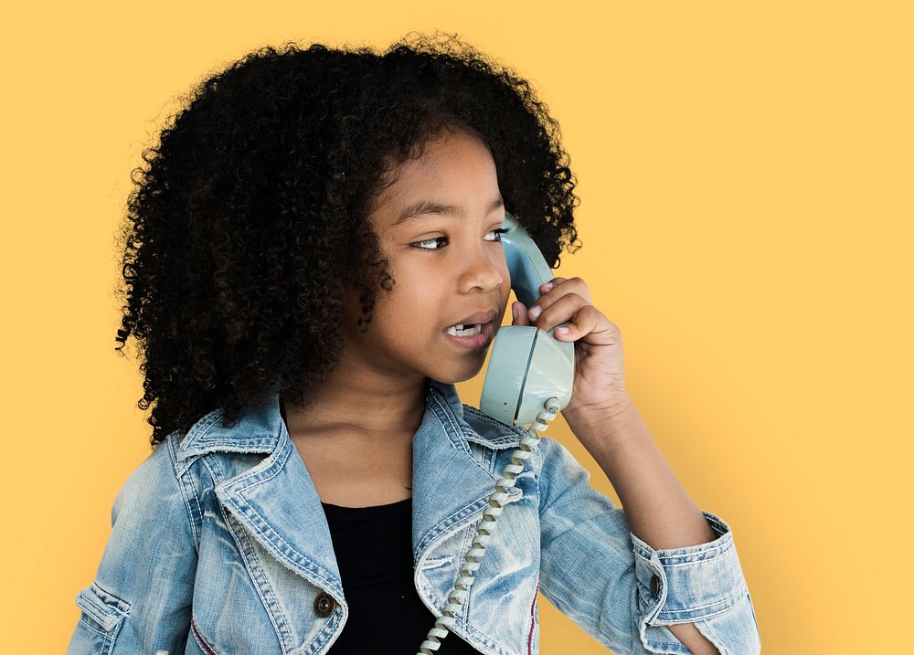 Little Girl Talking on the Phone Communication Studio Portrait