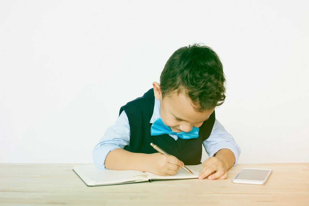 Young Schoolboy Writing Bookworm Education