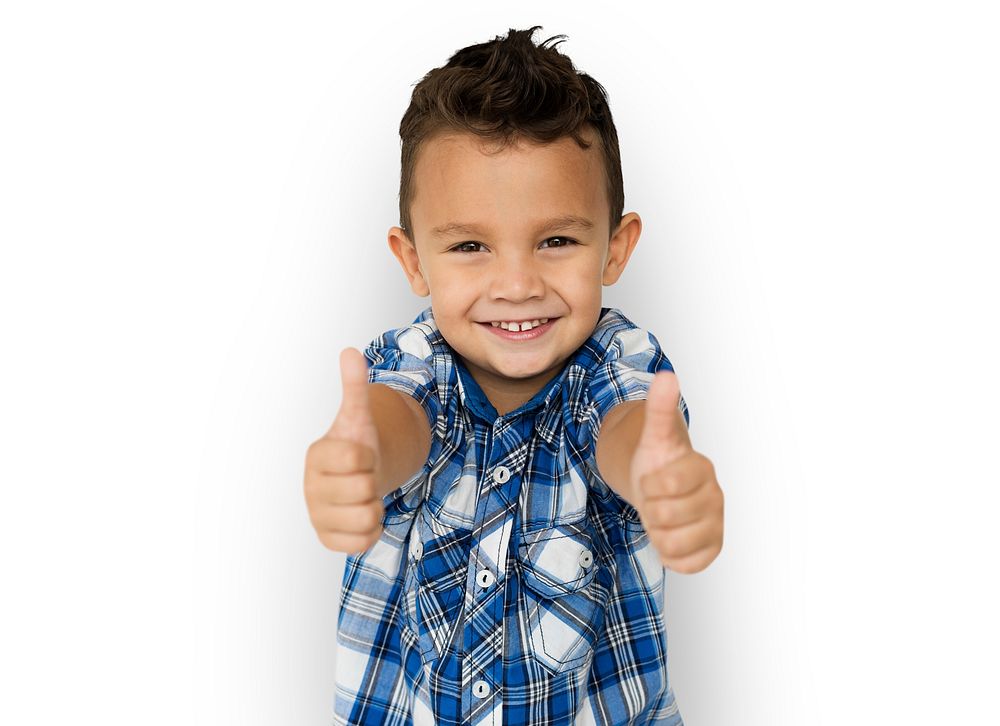 Boy giving two thumbs up