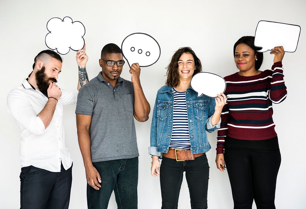 People Holding Paper Speech Bubble Icon