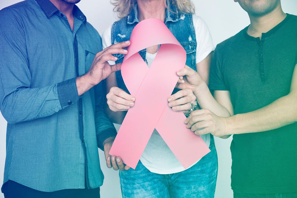 People Hands Show Pink Ribbon