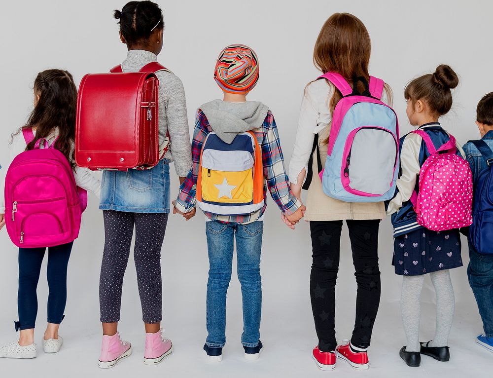 Group of Schoolers Kids with Backpack Behind Rear View on White Blackground