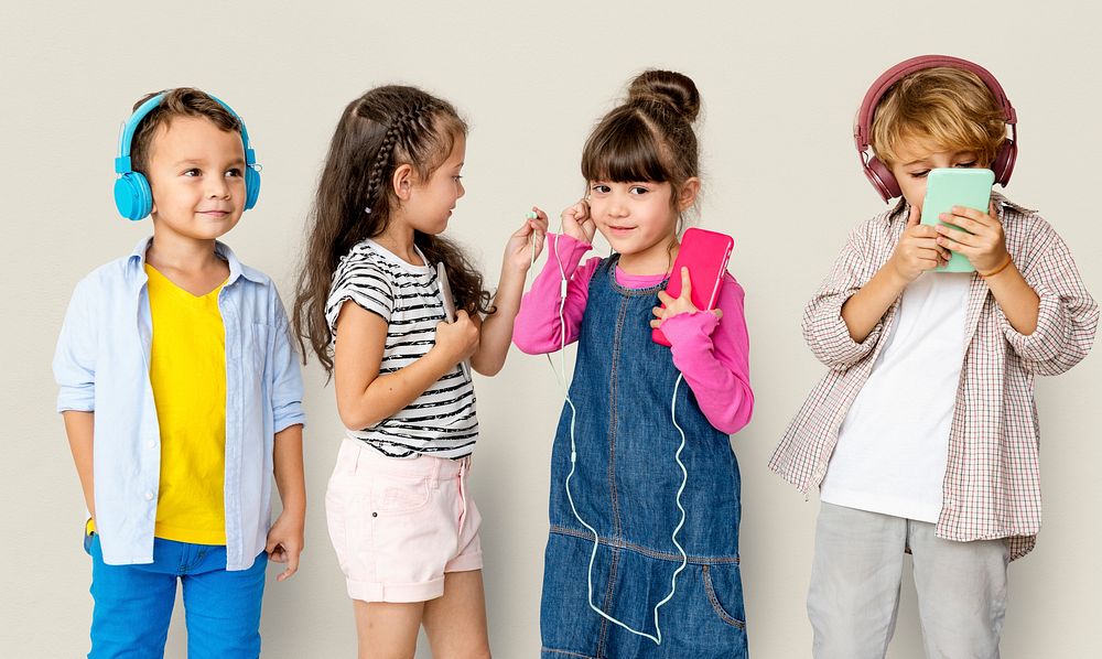Happiness group of cute and adorable children listening music
