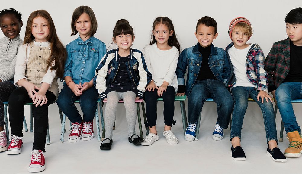 Group of Kids Sitting Togetherness Happiness Smiling on White Blackground