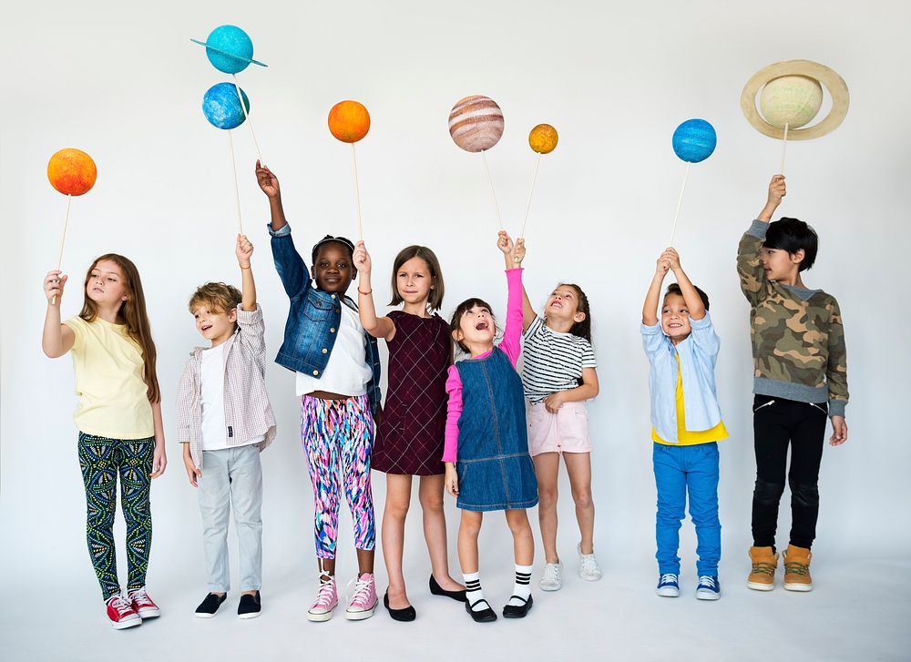 Children Holding Planets Studio Concept