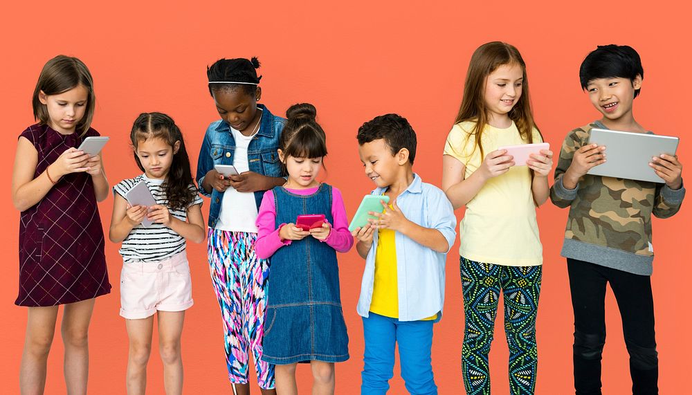 Happiness group of cute and adorable children using digital devices