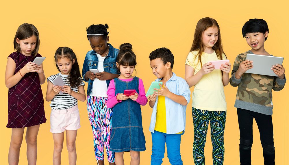 Happiness group of cute and adorable children using digital devices