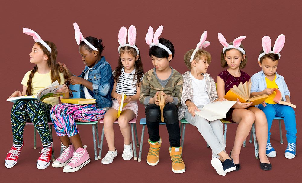 A bunny team reading a book