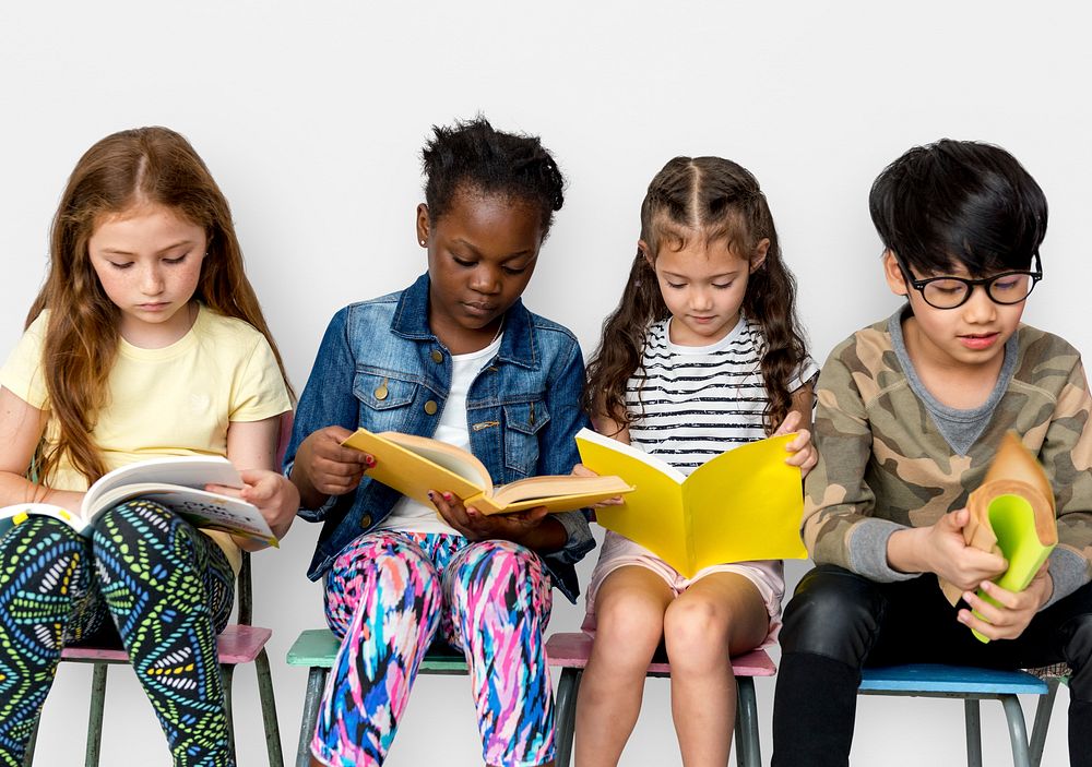 Group of children reading a book
