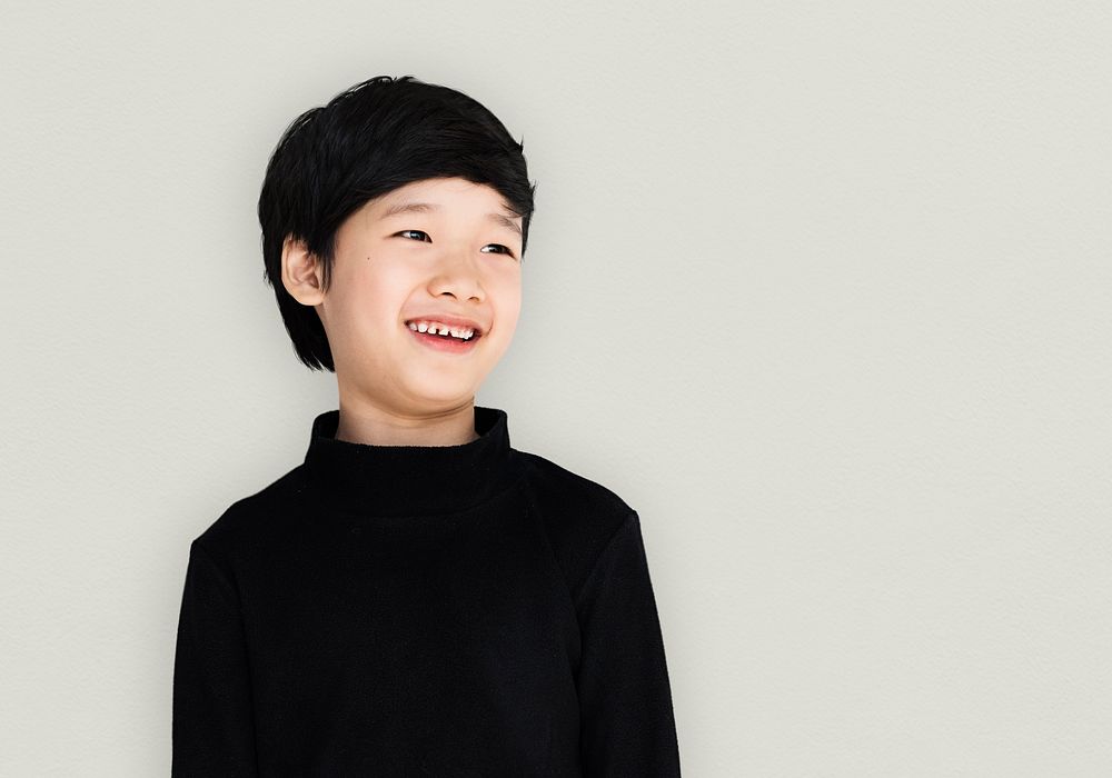 Asian ethnicity boy with a black shirt