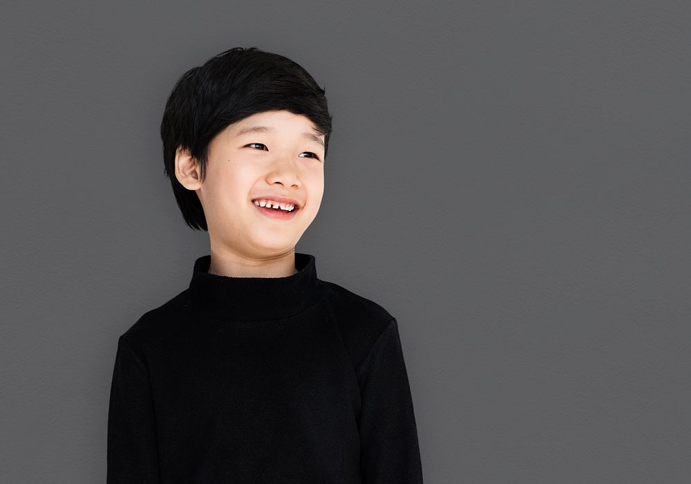 Asian ethnicity boy with a black shirt